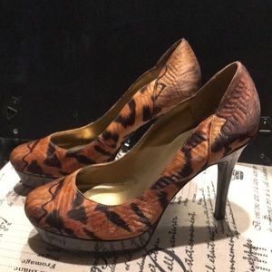 Guess golden brown material high heels.